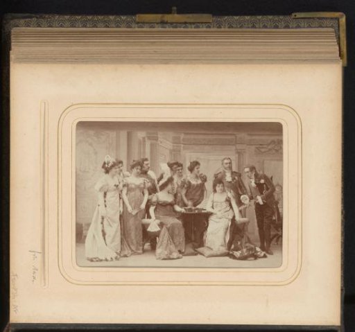 Group portrait of a theatre group in fancy costumes