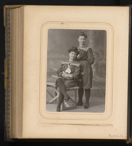 Studio portrait of two girls in sailor suits