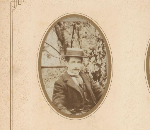 Portrait of a man with a straw hat