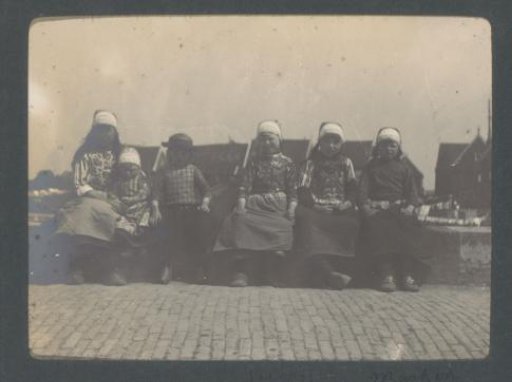 Group portrait of six children from Marken in traditional dress