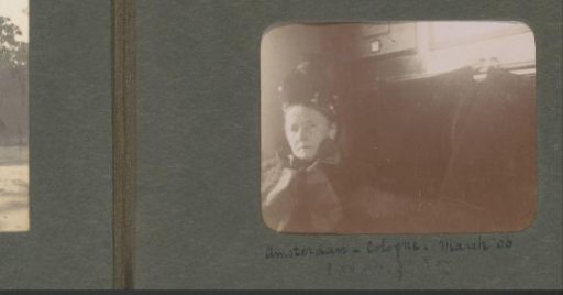 Portrait of a woman in a train compartment on the Amsterdam-Cologne route