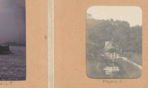 Ditch with a bridge near a house, probably in the Netherlands