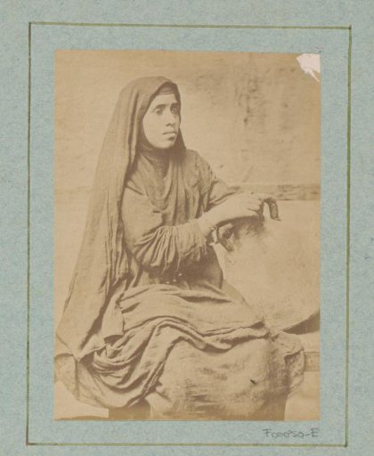 Seated Egyptian woman with a jug