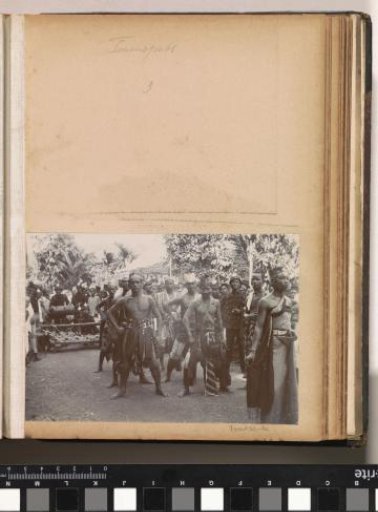 Men in festive dress with gamelan on Ambon