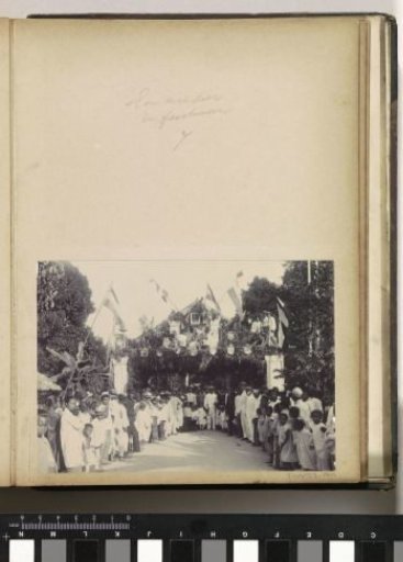 Audience at a decorated gate on Ambon