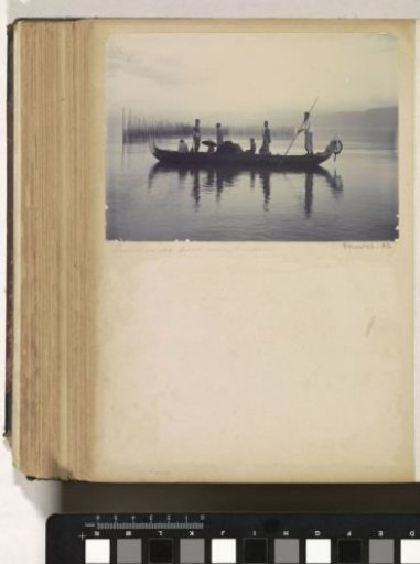 Men in a prauw in the bay of Ambon