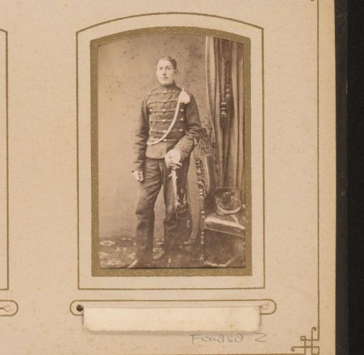 Portrait of a young man in military uniform