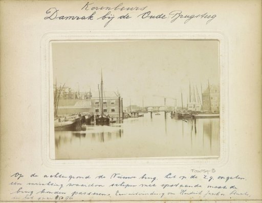 View of the Damrak towards the Oudebrug and the Nieuwebrug, with the old Korenbeurs on the left