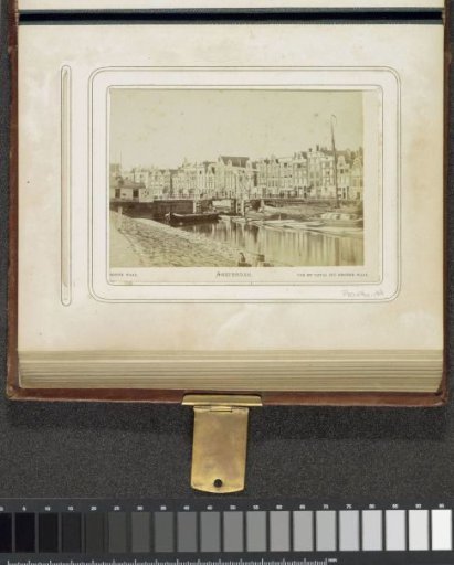 View of the Kromme Waal with timber transport in the foreground