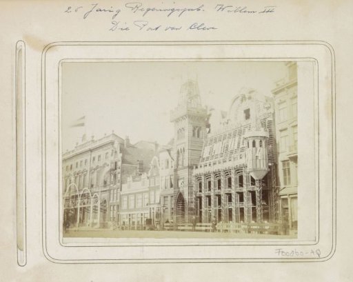 Royal Post Office (left) and restaurant-beerhouse Die Port van Cleve (right) on the Nieuwezijds Voorburgwal, decorated for the 25th anniversary of the reign of King Willem III