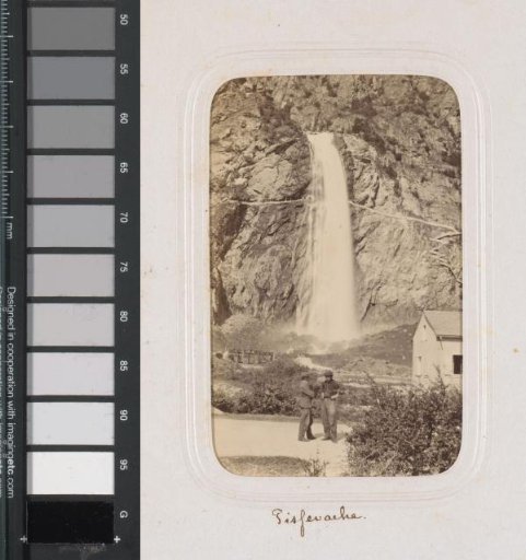 Two men at the Pissevache (cascade de Salanfe) in Vernayaz, Switzerland