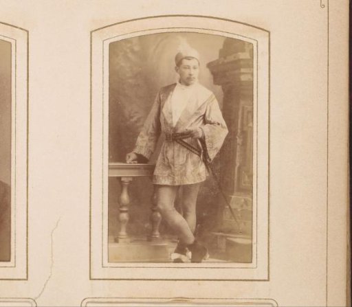 Portrait of a Boy in Costume with Hat and Sword