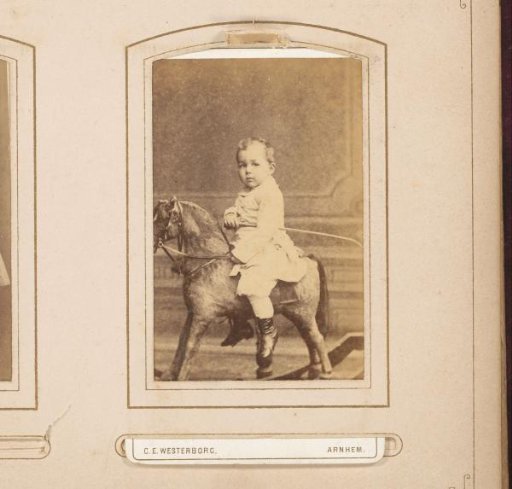 Portrait of a Boy on a Rocking Horse, with a Whip Under His Arm