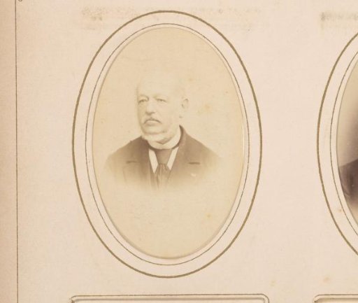 Portrait of a man with a mustache and ring beard