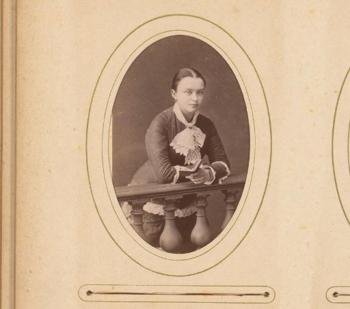 Portrait of a young woman, leaning on a balustrade