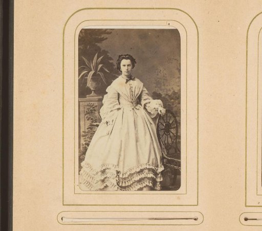 Portrait of a Woman Standing by a Chair