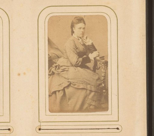 Portrait of a Woman Sitting at a Table