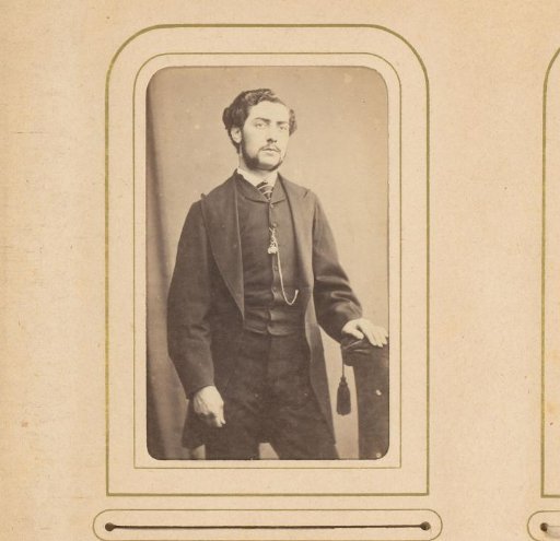 Portrait of a standing man with moustache and sideburns