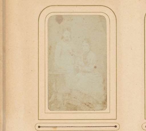 Portrait of a standing woman and a seated woman