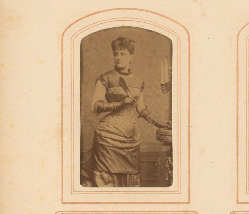 Portrait of a woman, holding a fan