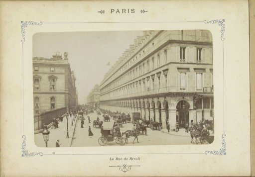 Rue de Rivoli in Paris with Horse-Drawn Carriages and Pedestrians