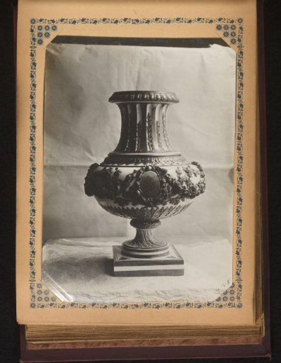 Vase decorated with a medallion, flowers, leaves, and branches