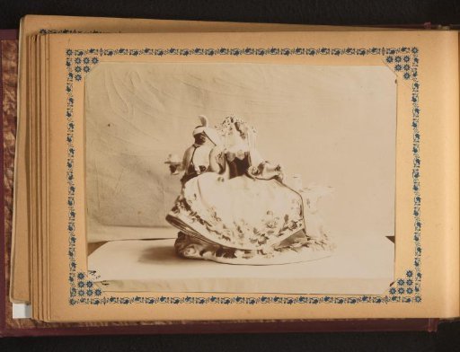 Sculpture of a seated woman and a servant