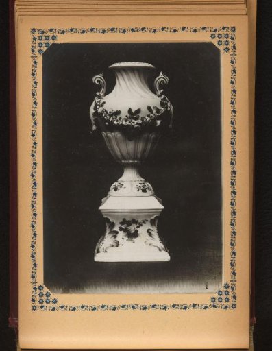 Vase painted with flowers and decorated with a garland