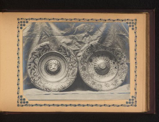 Two plates, decorated with leaves