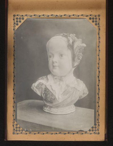 Porcelain bust of a girl with a cap