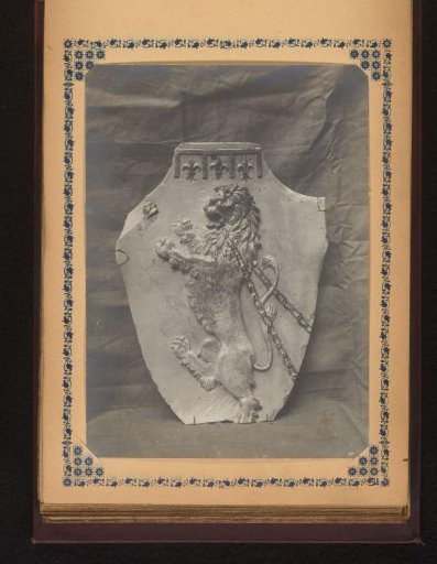 Sherd decorated with a lion in chains