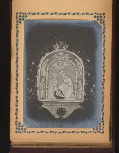 Relief with the birth of Christ in a garland