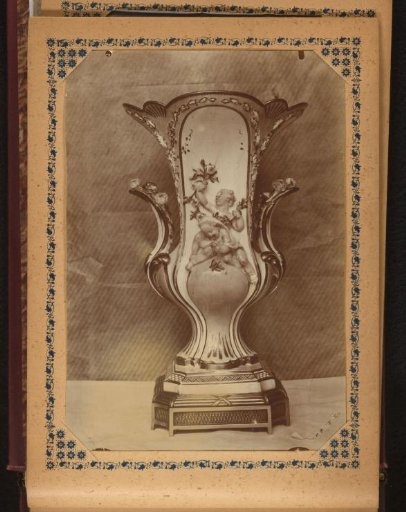 Vase decorated with two children and flowers