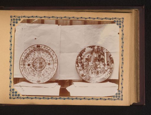 Two plates painted with scenes and mythological animals