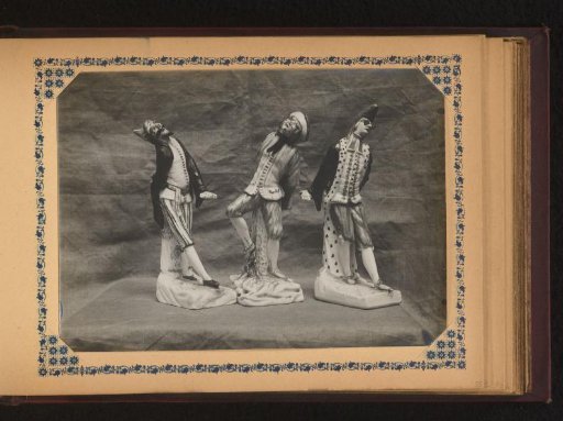 Three sculptures of figures