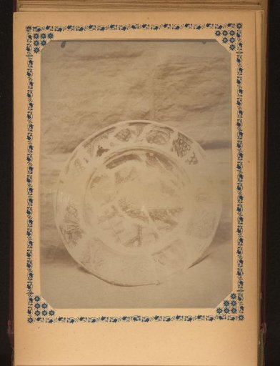 Plate painted with a scene