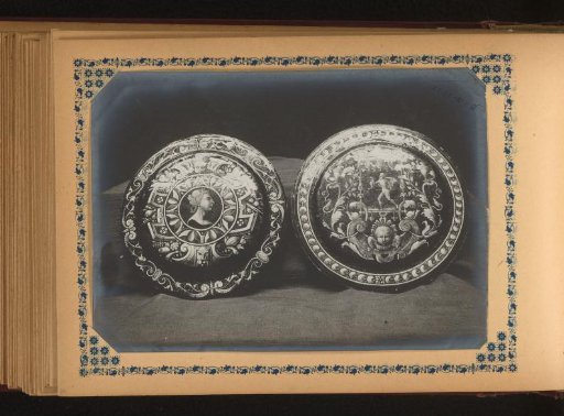 Two Plates Painted with Cherubs Among Other Things