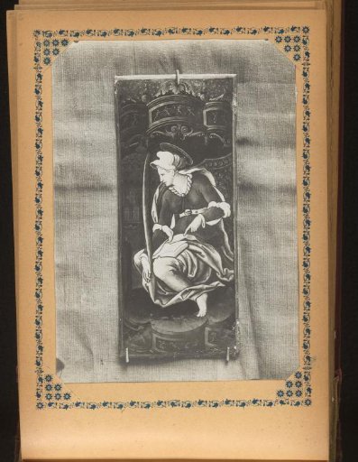 Panel painted with a saint holding a book