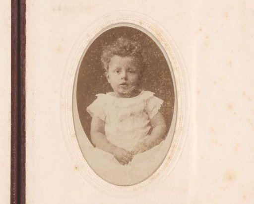 Portrait of a child in white dress