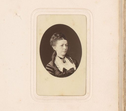 Portrait of a woman with a necklace with a medallion