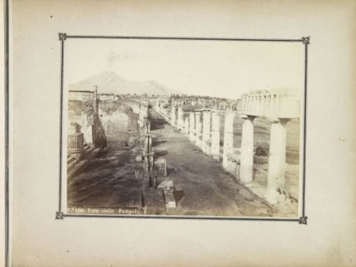 View of the ruins of the forum in Pompeii with Vesuvius in the background