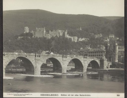 View of Schloss Heidelberg with a bridge over the Neckar in the foreground