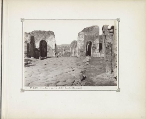 Remains of a street and an entrance gate to tombs in Pompeii