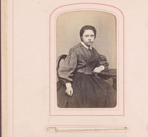 Portrait of a girl sitting at a table