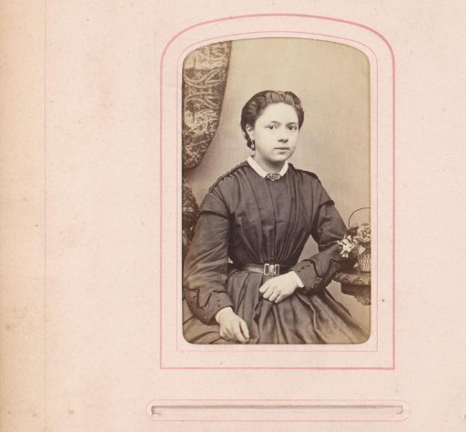 Portrait of a girl sitting at a table