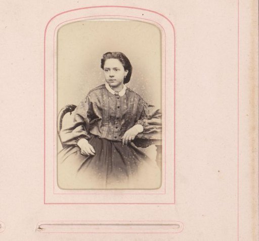 Portrait of a girl sitting at a table