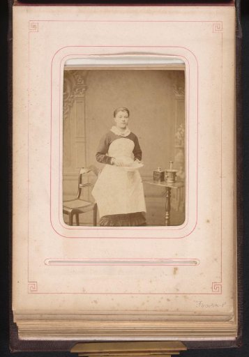 Portrait of a maid with apron and a plate in her hand