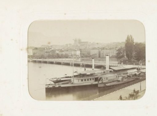 Geneva viewed from the Quai du Mont Blanc, with moored ships in the foreground