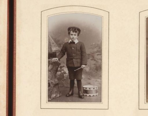 Portrait of a boy with a drum