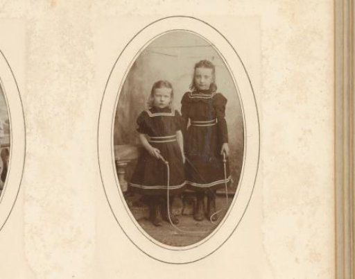 Portrait of two girls with a skipping rope